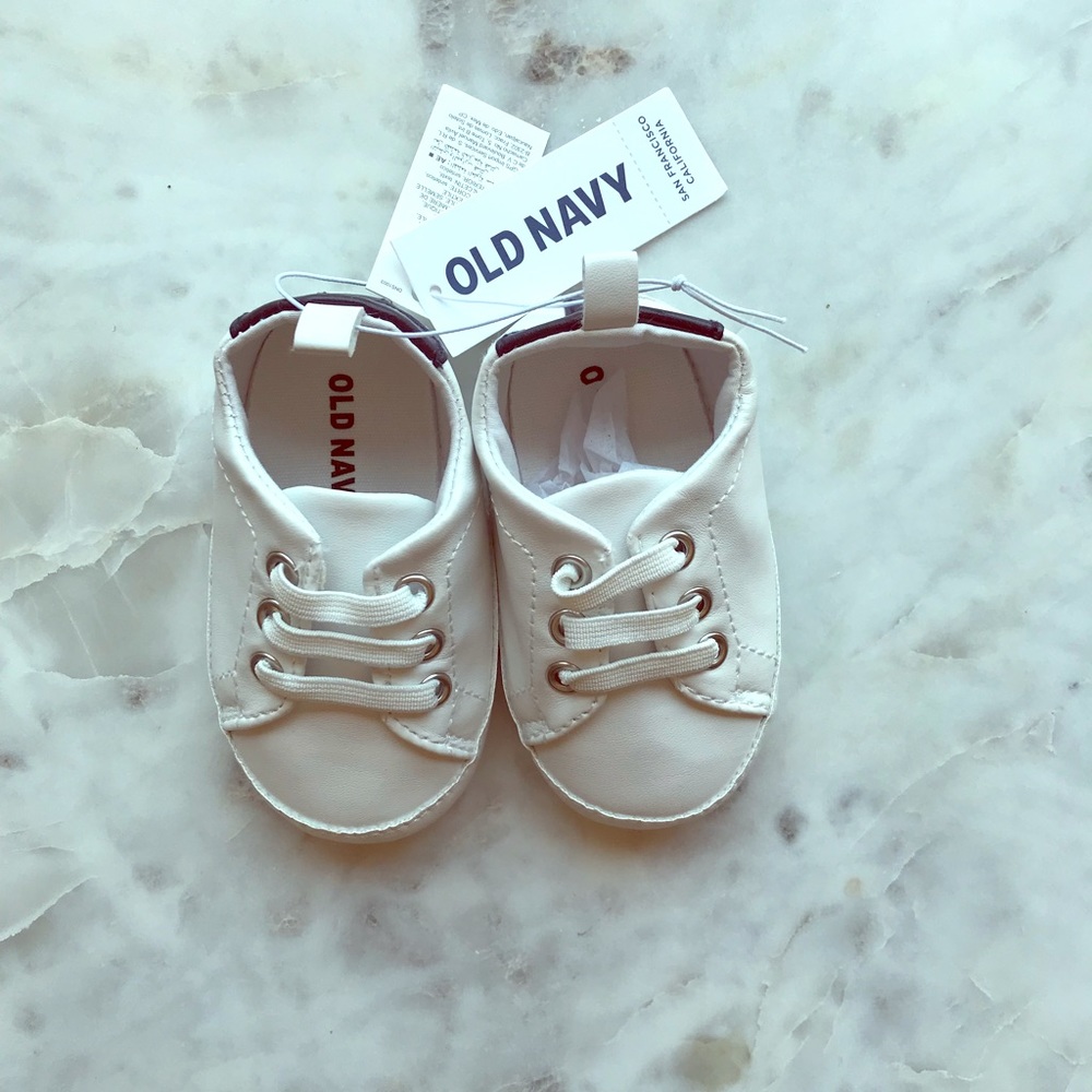 White baby “sneaker” slip-on shoes